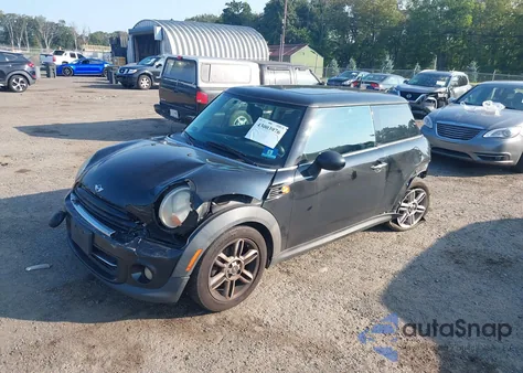 2011 Mini Cooper z USA, uszkodzony, nr VIN WMWSU3C59BTX96719